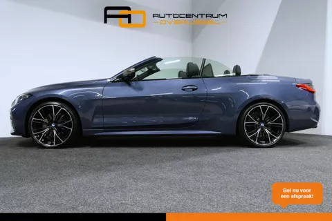 BMW 4-serie Cabrio M440i xDrive High Executive / Air Collar (nekverwarming / BMW Laserlight / Elektr. verstelbare voorstoelen (links met memory) / Harman Kardon Surround Sound / Stoelverwarming / 20" / Rondomzichtcamera / HUD / Apple Carplay - Android Auto / Adaptief M onderstel / Elektr. wegklapbare trekhaak / Leder interieur / Dodehoekdetectie / Achteruitrijcamera