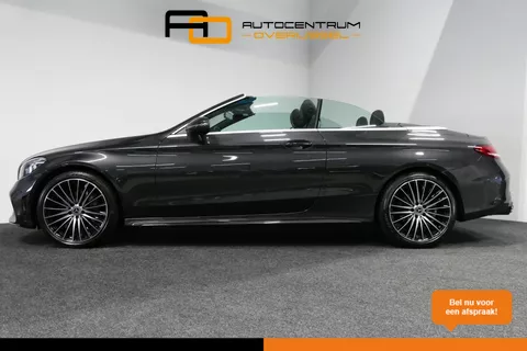 Mercedes-Benz C-klasse Cabrio 180 AMG Line / C63S AMG Diffuser / Nekverwarming - Airscarf / Panamericana Grille / Stoelverwarming / Apple Carplay - Android Auto / Full LED / Ambienteverlichting / Achteruitrijcamera / Cruise Control / Dodehoekdetectie / 20'' LMV