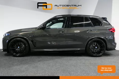 BMW X5 xDrive50e M Sport / M Bodykit / Achterasbesturing / Panoramadak / Elektr. verstelbare voorstoelen + memory / Softclose / Luchtvering / Elektr. wegklapbare trekhaak / HUD Professional / Harman Kardon Surround Sound / 22'' LMV / Ambienteverlichting / Stoelverwarming V+ A / Achteruitrijcamera / Shadow Line